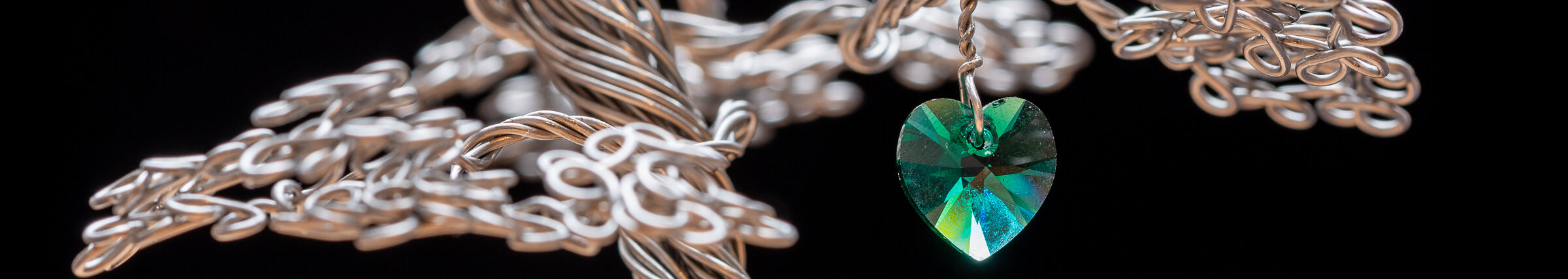 Stainless steel maple tree with emerald green crystal heart