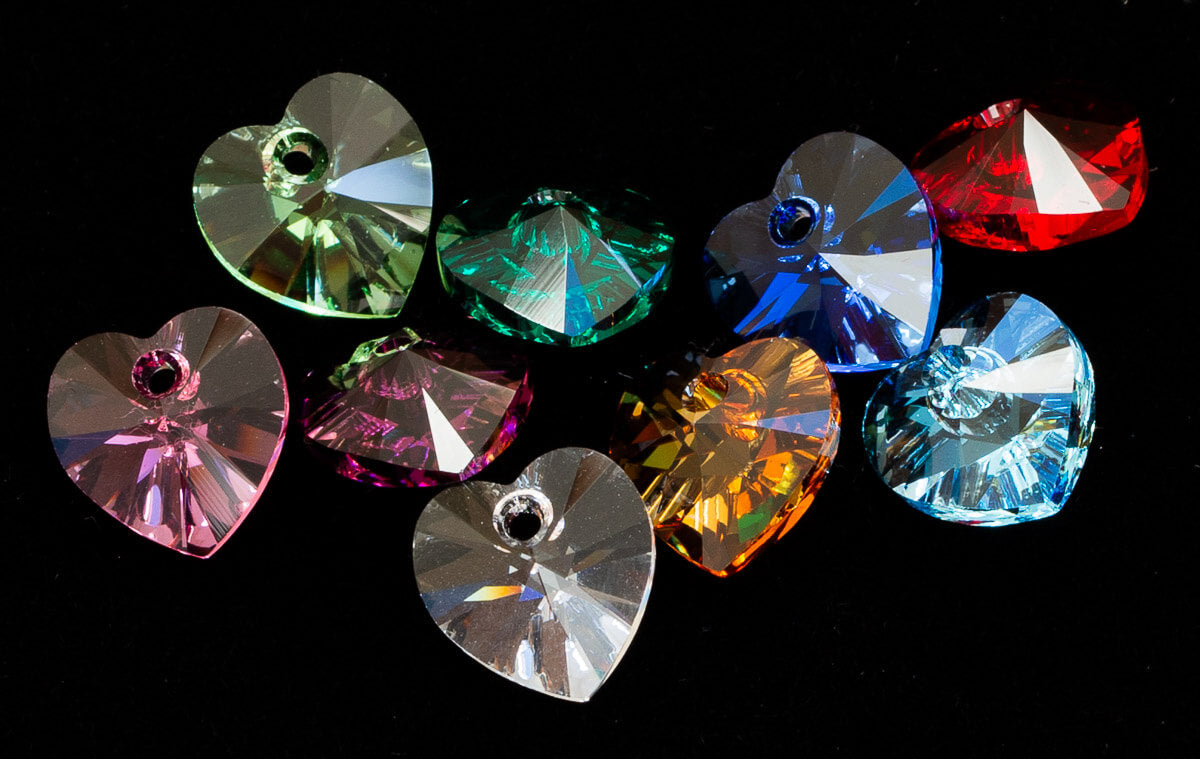 Crystal Hearts colour examples on black background