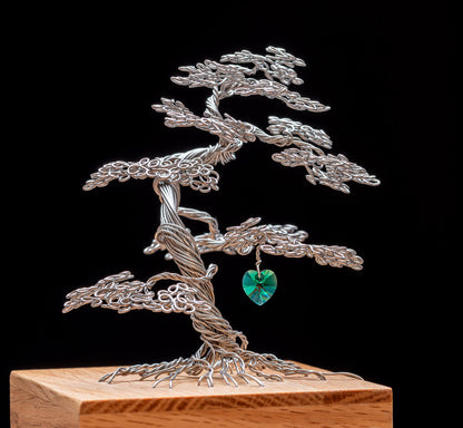 Stainless steel memory tree with emerald green crystal heart on solid oak box