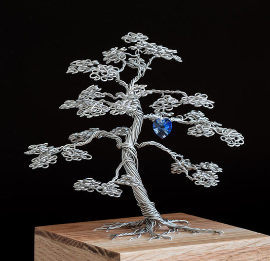 Stainless steel memorial tree on solid oak box with sapphire coloured crystal heart